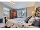 Cozy bedroom with natural light at 9680 Burberry Way, Highlands Ranch, CO 80129