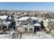 Two-story house with a snowy yard, viewed from above at 27750 E Lakeview Dr, Aurora, CO 80016