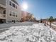 Large backyard covered in snow, next to home at 27750 E Lakeview Dr, Aurora, CO 80016