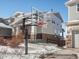 Basketball hoop in front of a two story house with gray siding at 27750 E Lakeview Dr, Aurora, CO 80016