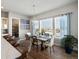 Bright dining room with a rustic table and stunning views at 27750 E Lakeview Dr, Aurora, CO 80016