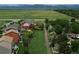 Aerial shot showcasing backyards, surrounding landscape, and mountain views at 942 Wagon Bend Rd, Berthoud, CO 80513