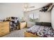 Inviting bedroom with plenty of natural light, dresser, and cozy decor at 942 Wagon Bend Rd, Berthoud, CO 80513