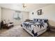 Comfortable main bedroom with ceiling fan, natural light, and relaxing atmosphere at 942 Wagon Bend Rd, Berthoud, CO 80513