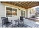 Back patio with outdoor seating and a view of the backyard at 12089 W Burgundy Ave, Littleton, CO 80127