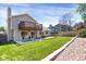 Backyard with a lawn, patio, and a back deck at 12089 W Burgundy Ave, Littleton, CO 80127