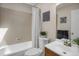 Functional bathroom featuring a shower-tub combination, toilet, and a vanity with a sink at 12089 W Burgundy Ave, Littleton, CO 80127