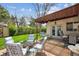 Charming patio area with comfortable seating around a fire pit, perfect for outdoor entertaining at 5856 Simms St, Arvada, CO 80004