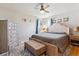 Bedroom with large bed, natural light, and wood floors at 5856 Simms St, Arvada, CO 80004