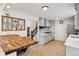 Modern kitchen featuring gray cabinets, white countertops, and stainless steel appliances at 5856 Simms St, Arvada, CO 80004