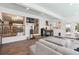 Spacious living room with open view to dining room. Perfect for entertaining guests at 5856 Simms St, Arvada, CO 80004