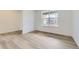 Office space with light colored wood flooring, white walls, and natural light at 24715 E Evans Dr, Aurora, CO 80018