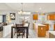 Bright dining area with table and chairs, adjacent to kitchen at 793 S 22Nd Ave, Brighton, CO 80601