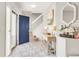 Bright entryway with tiled floor, console table, and staircase at 793 S 22Nd Ave, Brighton, CO 80601