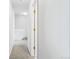 Bright hallway with carpeted floors and access to upper level at 793 S 22Nd Ave, Brighton, CO 80601