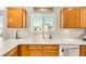 Kitchen with light wood cabinets and white countertops at 793 S 22Nd Ave, Brighton, CO 80601