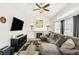 Relaxing living room, featuring a fireplace and large TV at 793 S 22Nd Ave, Brighton, CO 80601