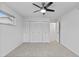 Bedroom with ceiling fan, large closet, and access to another room at 9868 Appletree Pl, Thornton, CO 80260