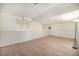 Spacious basement features white walls and paneled wainscoting at 12632 James Ct, Broomfield, CO 80020