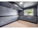 Basement in gray, with a window and tan carpet at 12632 James Ct, Broomfield, CO 80020