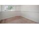 Basement with white walls, light trim, and a window at 12632 James Ct, Broomfield, CO 80020