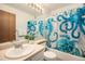 Bathroom with blue marine-themed shower curtain, vanity and sink at 12632 James Ct, Broomfield, CO 80020