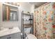Bright bathroom with modern fixtures and decorative shower curtain at 12632 James Ct, Broomfield, CO 80020