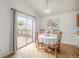 Charming dining area with sliding glass doors to the deck at 12632 James Ct, Broomfield, CO 80020