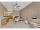 Relaxing bedroom with soft carpet and a full bathroom to create a private retreat at 7140 Simms St # 102, Arvada, CO 80004