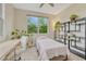 Inviting room, filled with greenery, that is perfect for a bedroom or home office at 7140 Simms St # 102, Arvada, CO 80004