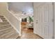 Inviting living room with hardwood floors and a cozy atmosphere with contemporary staircase at 7140 Simms St # 102, Arvada, CO 80004