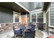 Cozy patio with outdoor furniture, ideal for enjoying the fresh air and outdoor dining at 7140 Simms St # 102, Arvada, CO 80004
