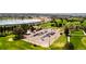 Overhead view of a golf course, lake, parking lot, and highways, showcasing the community's amenities and accessibility at 5101 Quitman St, Denver, CO 80212