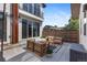 Backyard patio with modern outdoor furniture, and a basketball hoop at 5101 Quitman St, Denver, CO 80212