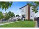 Stylish two-story house with a well-kept lawn, modern design, and inviting curb appeal in a quiet neighborhood at 5101 Quitman St, Denver, CO 80212