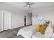 Spacious main bedroom with ceiling fan, walk-in closet, and ample natural light at 5101 Quitman St, Denver, CO 80212