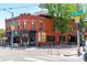 Charming brick corner building with a restaurant, located at a lively street intersection at 5101 Quitman St, Denver, CO 80212