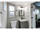 Stylish bathroom featuring modern fixtures and a bright window at 795 Troy Ct, Aurora, CO 80011