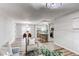 Spacious open-concept kitchen and dining area with a modern design at 795 Troy Ct, Aurora, CO 80011