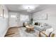 Comfortable living room with stylish decor and ample natural light from the front window at 795 Troy Ct, Aurora, CO 80011