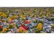 Stunning aerial view of the neighborhood showcasing a vibrant mix of homes and tree-lined streets at 3709 Tejon St, Denver, CO 80211