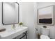 Modern bathroom with vessel sink, toilet and contemporary finishes at 3709 Tejon St, Denver, CO 80211