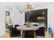 Contemporary dining room with modern light fixture and modern design at 3709 Tejon St, Denver, CO 80211