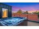 Relaxing rooftop hot tub with city views and a colorful sunset at 3709 Tejon St, Denver, CO 80211