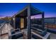 Stylish rooftop deck with modern pergola, comfortable seating, and stunning views of the city skyline at 3709 Tejon St, Denver, CO 80211