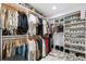 Organized walk-in closet with custom shelving and hanging rods, offering ample storage for clothes and accessories at 3709 Tejon St, Denver, CO 80211