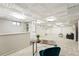 Spacious finished basement with ample closet space for storage and cozy seating area at 7413 S Tamarac St, Centennial, CO 80112