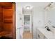 Bright bathroom features a sauna, modern vanity, and tiled shower for a spa-like experience at 7413 S Tamarac St, Centennial, CO 80112