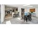 Dining room with skylights offers an open layout into the kitchen at 7413 S Tamarac St, Centennial, CO 80112