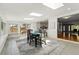 Bright dining room with skylights and kitchen view at 7413 S Tamarac St, Centennial, CO 80112